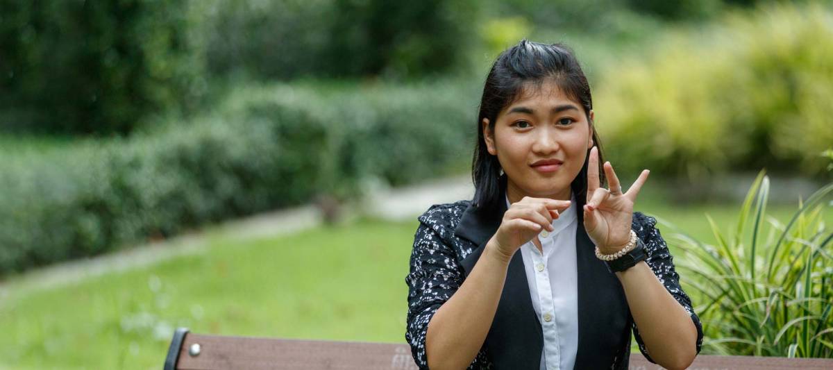Thai sign language translator signing.